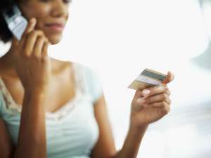 woman-giving-credit-card-over-the-phone.jpg